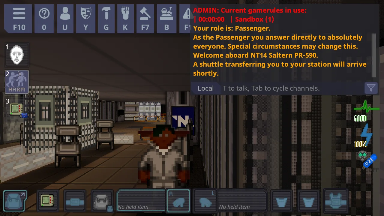 A passenger standing in a corridor with benches and a vending machine behind them
